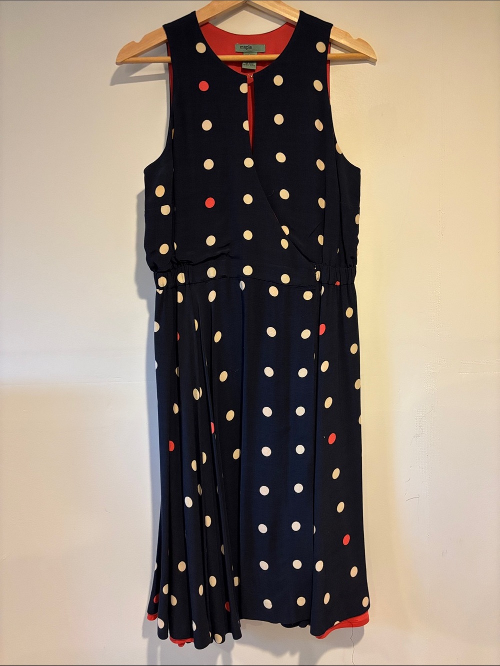 Sleeveless Navy Polka Dot Midi Dress with Red Accent